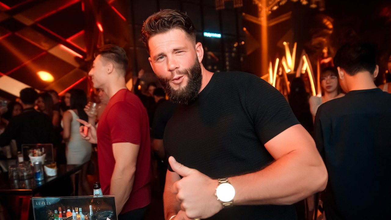 Bartender serving signature cocktails during Bangkok nightlife tour